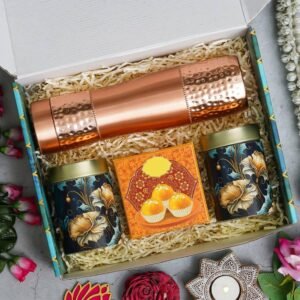 1 Copper Bottle (900ML) – 150gms each Almond & Raisin in Tin Jar – 4 Ladoo candle